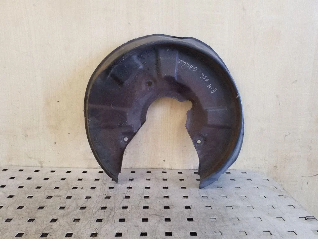 Rear brake disc plate dust cover – left