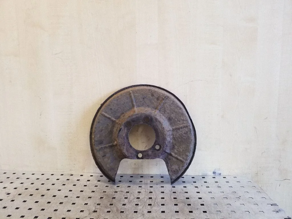 Tagumise piduriketta tolmukaitse – vasak