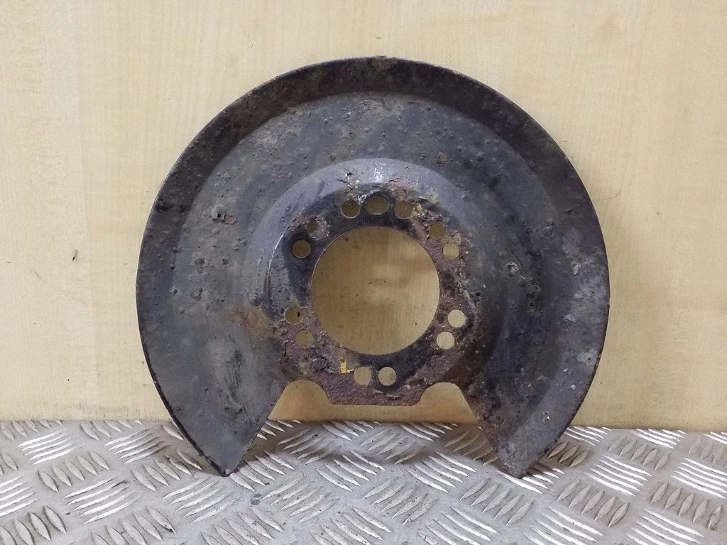 Rear brake disc plate dust cover – left