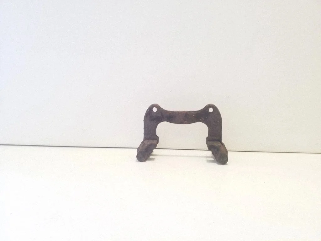 Brake caliper pad carrier rear