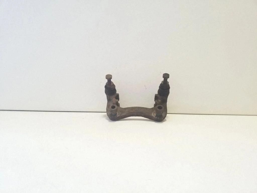 Brake caliper pad carrier rear
