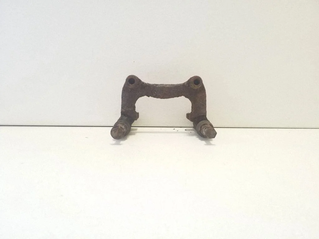 Brake caliper pad carrier rear