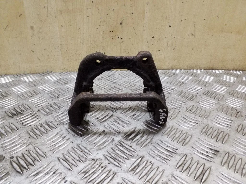 Brake caliper pad carrier rear – right