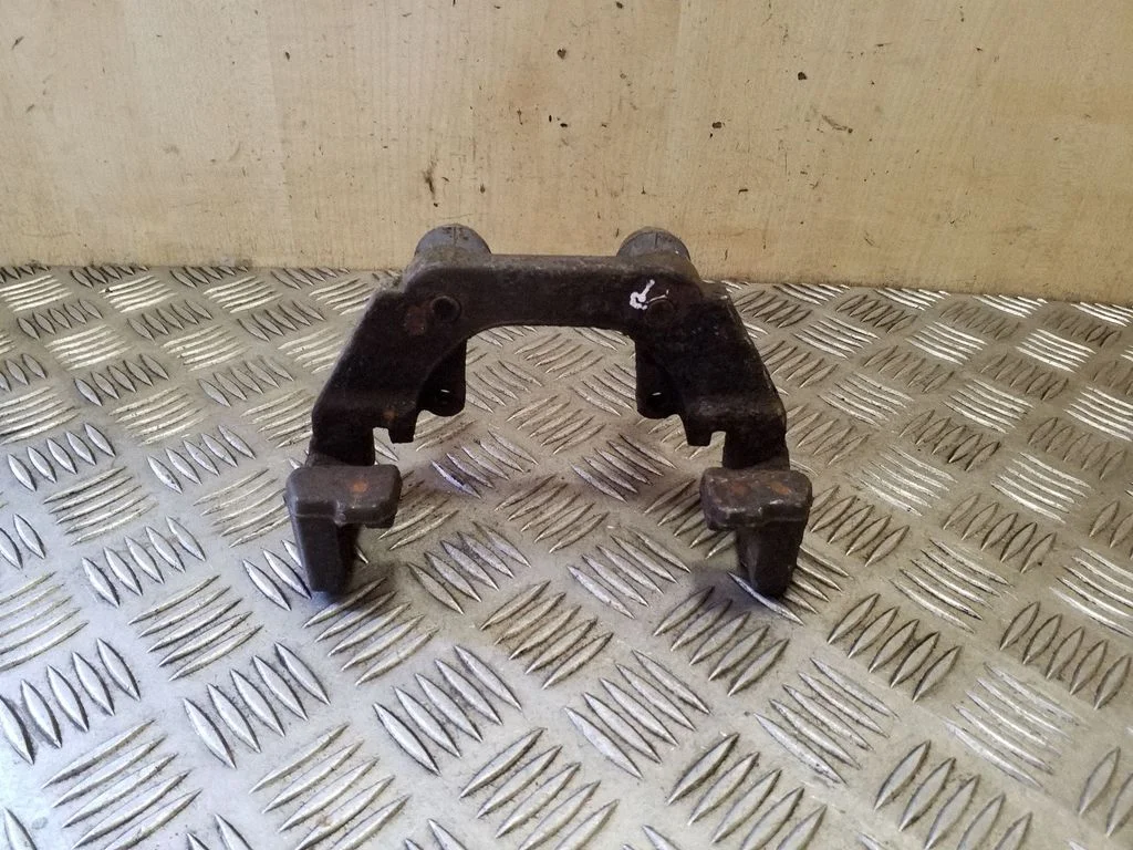 Brake caliper pad carrier rear – right