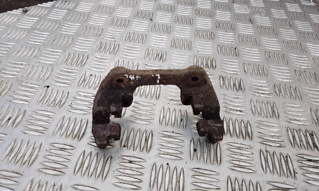 Brake caliper pad carrier rear