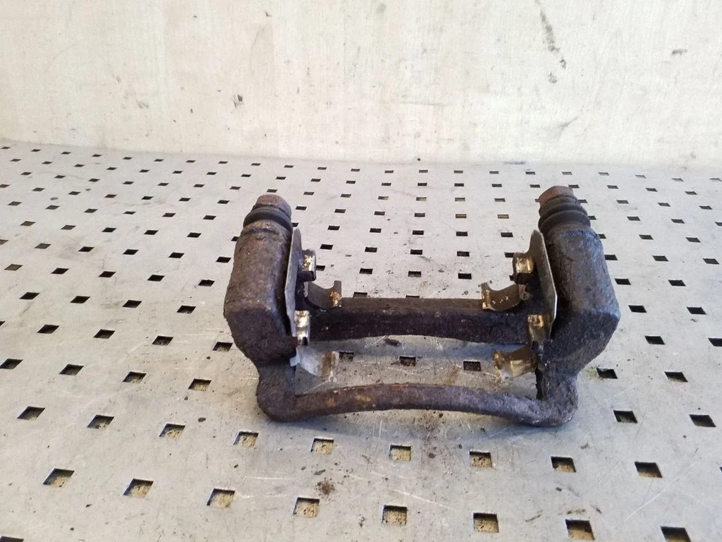 Brake caliper pad carrier rear