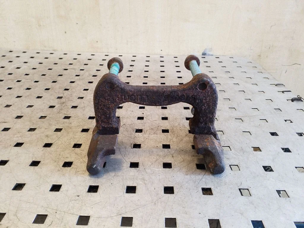 Brake caliper pad carrier rear
