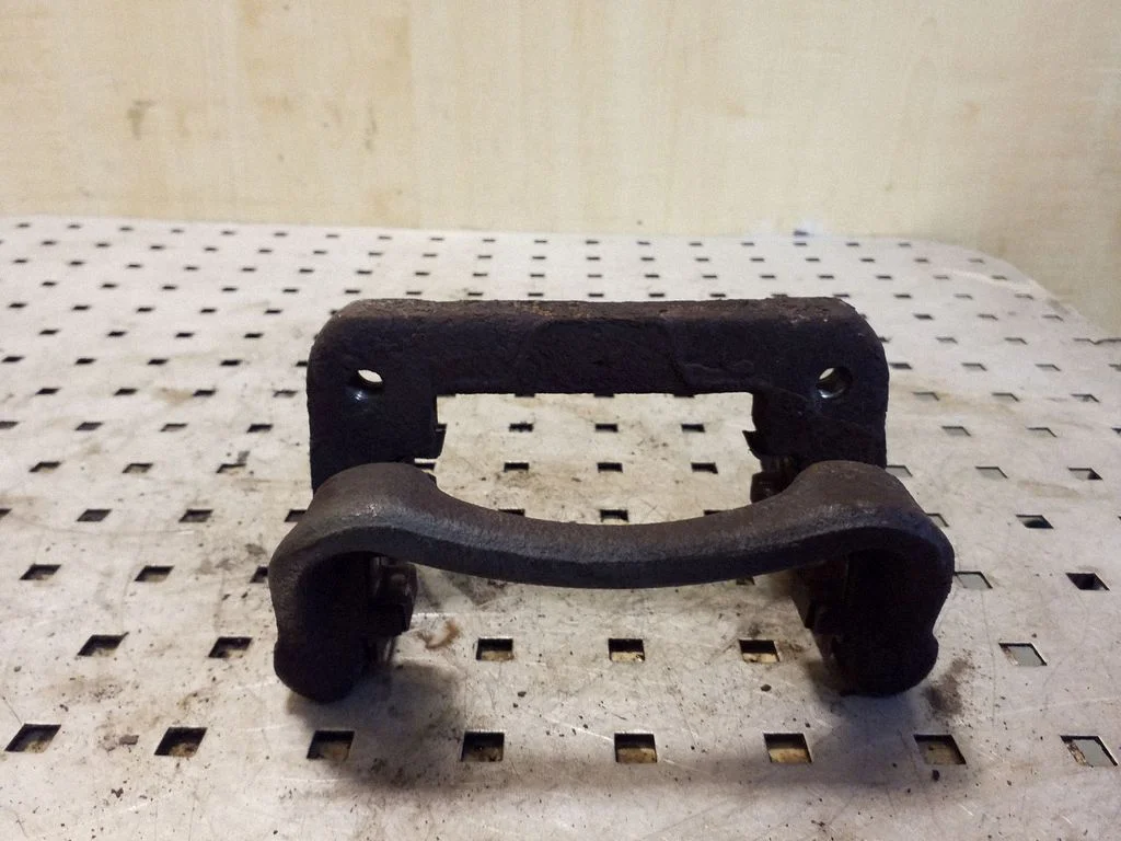 Brake caliper pad carrier rear – Opel Insignia A (2008-2017)