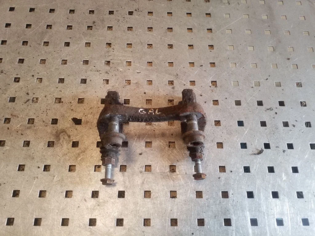 Brake caliper pad carrier rear