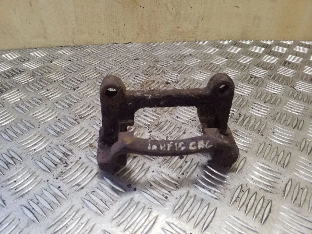 Brake caliper pad carrier rear