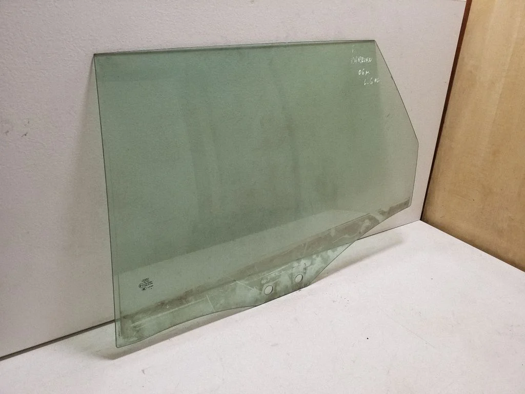 Rear door window glass – left