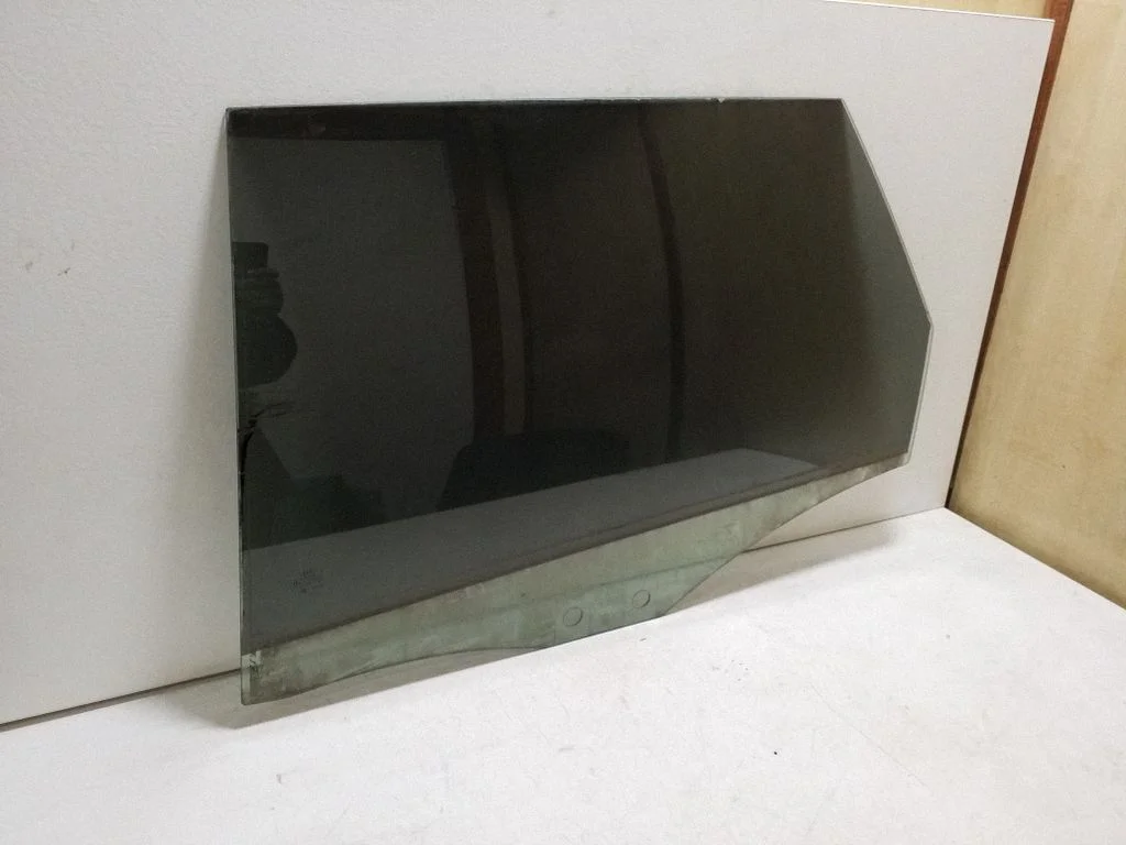 Rear door window glass – left