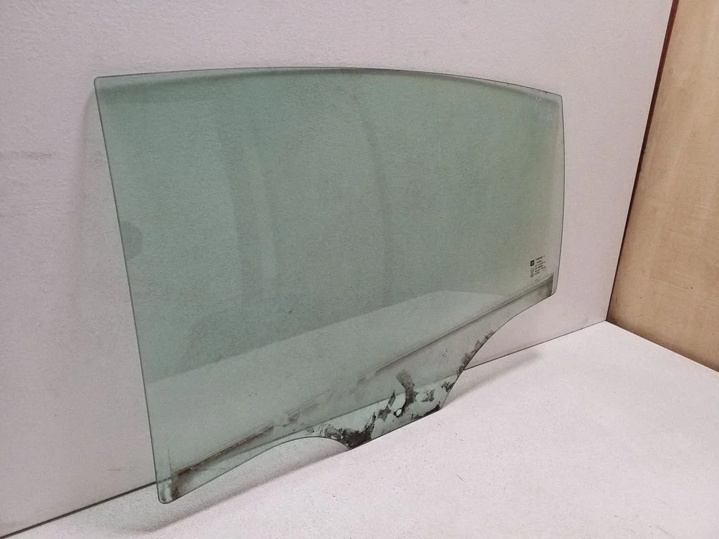 Rear door window glass – left