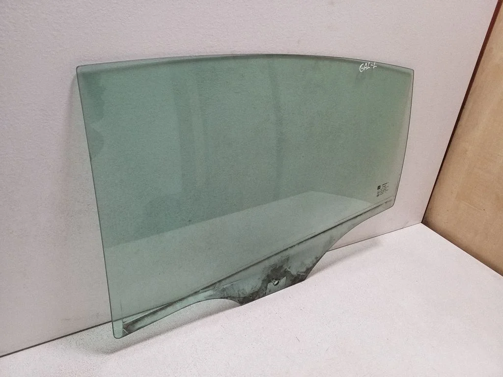 Rear door window glass – left
