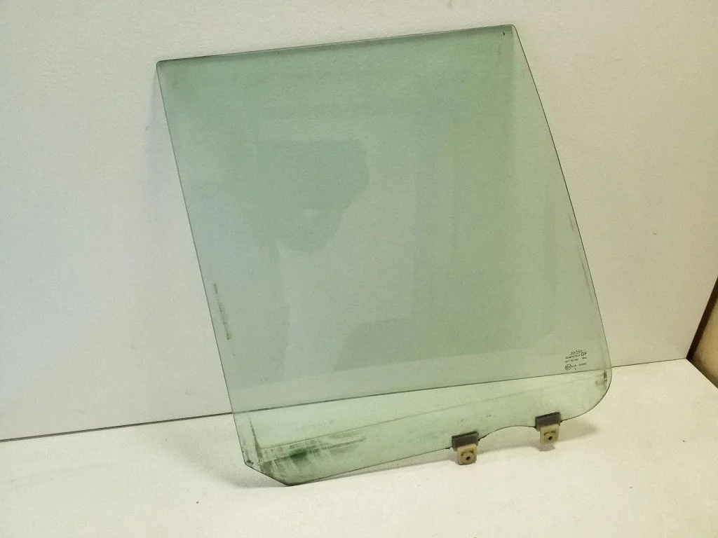 Rear door window glass – left