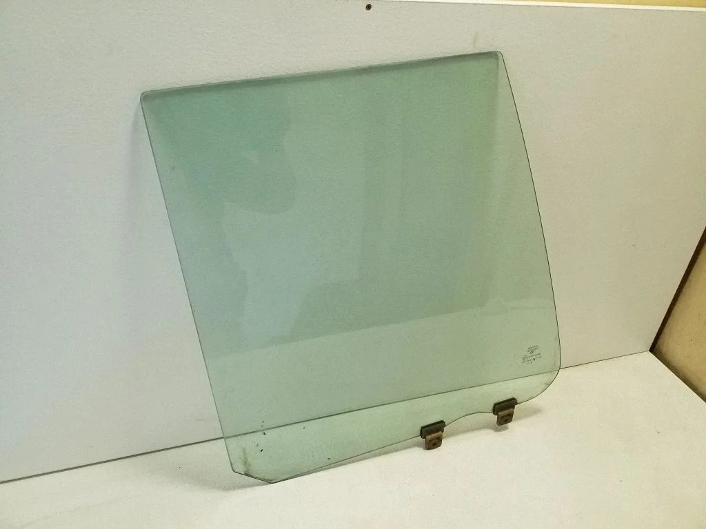 Rear door window glass – left
