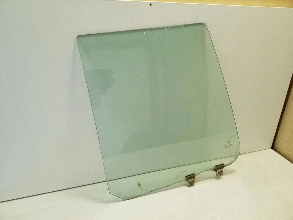 Rear door window glass – left