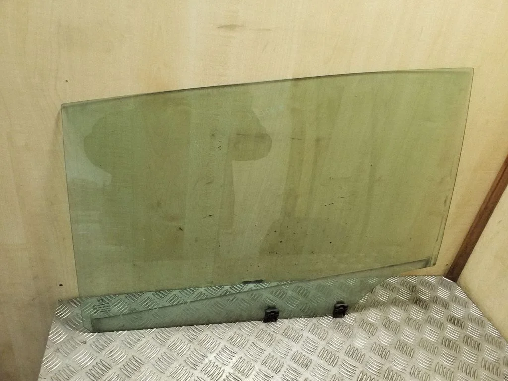 Rear door window glass – left