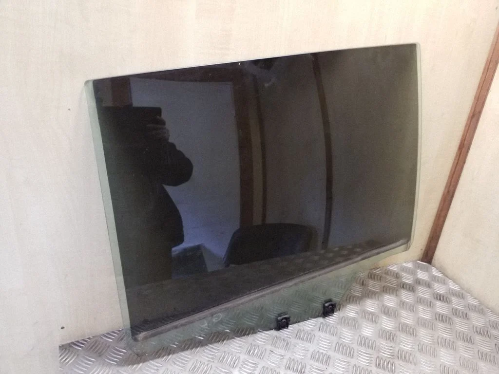 Rear door window glass – left