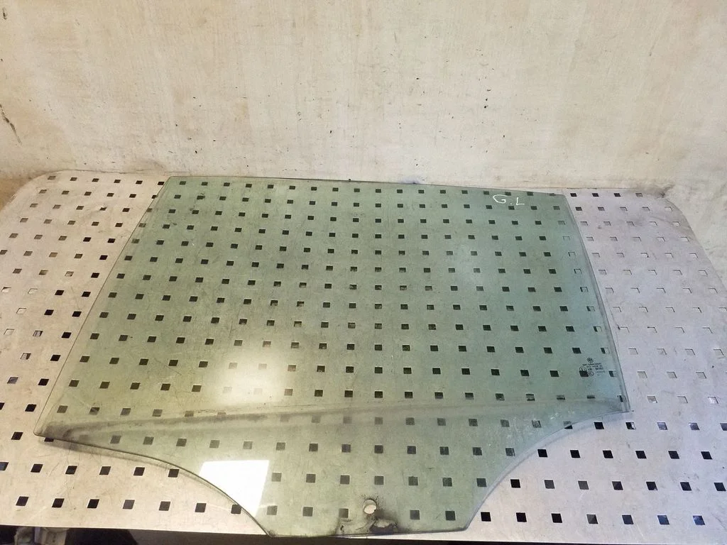 Rear door window glass – left