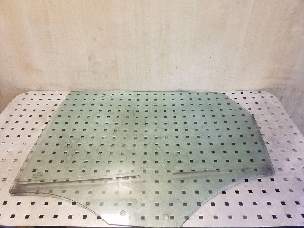Rear door window glass – left