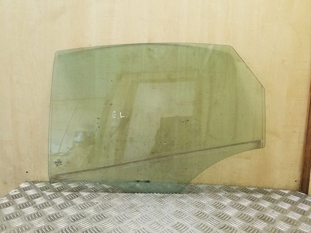 Rear door window glass – left