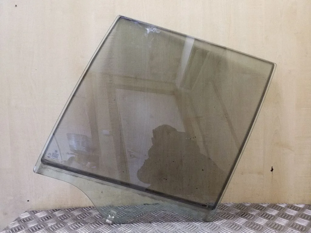 Rear door window glass – left