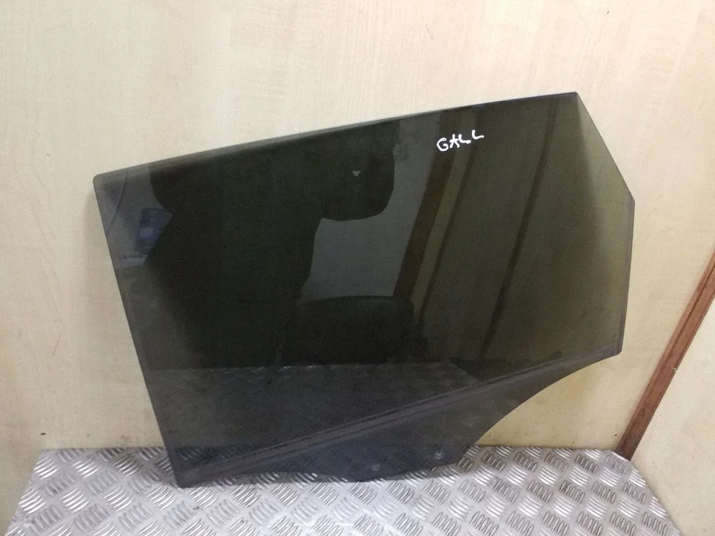Rear door window glass – left