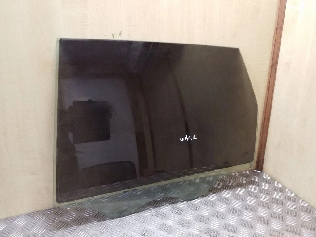 Rear door window glass – left