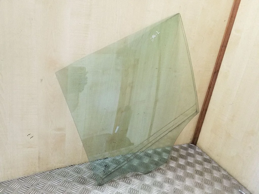 Rear door window glass – left