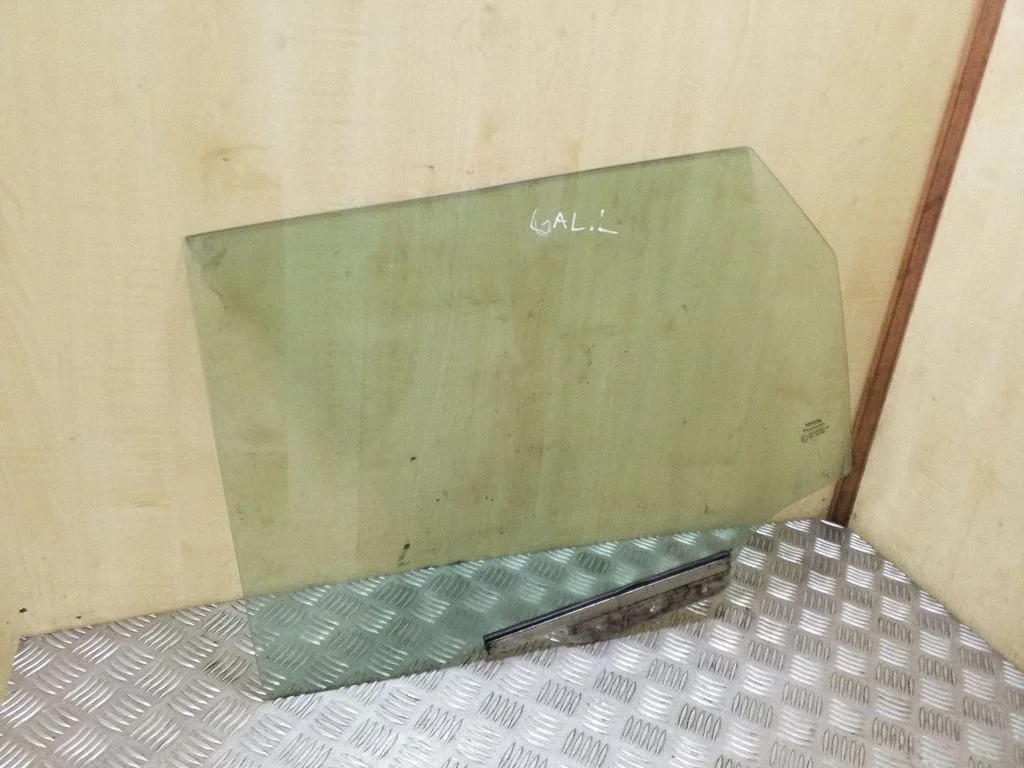 Rear door window glass – left