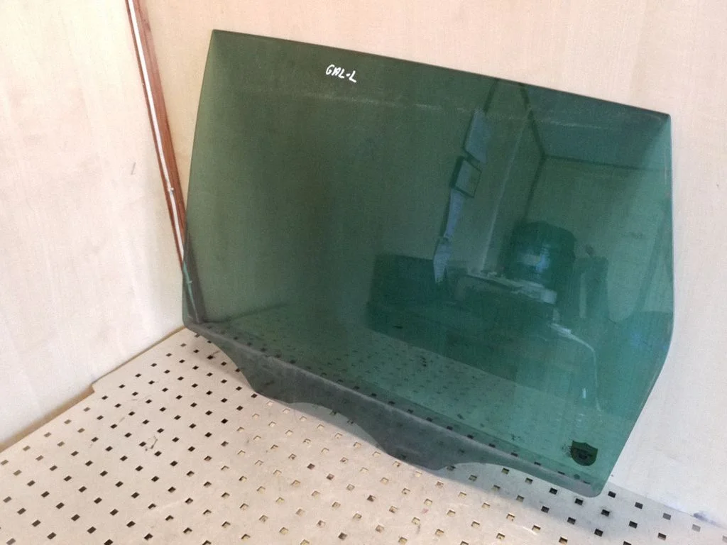 Rear door window glass – left
