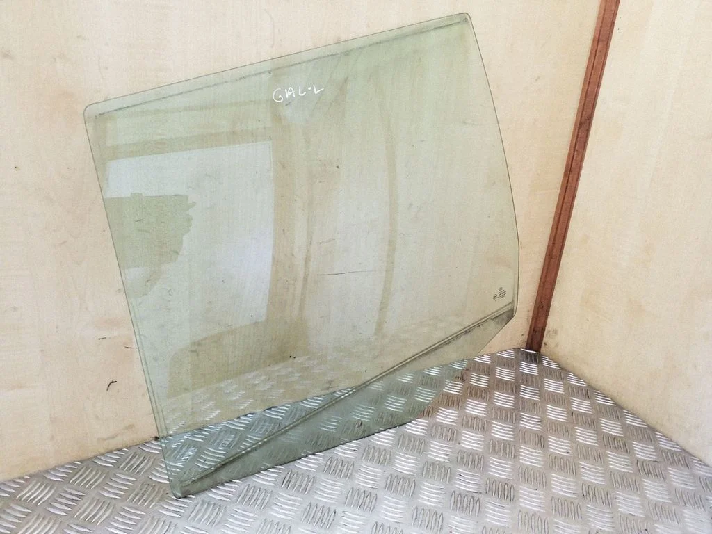 Rear door window glass – left