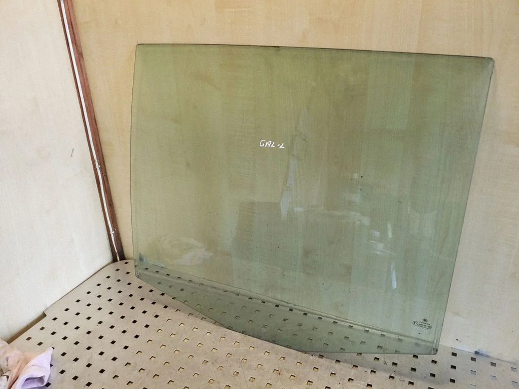Rear door window glass – left
