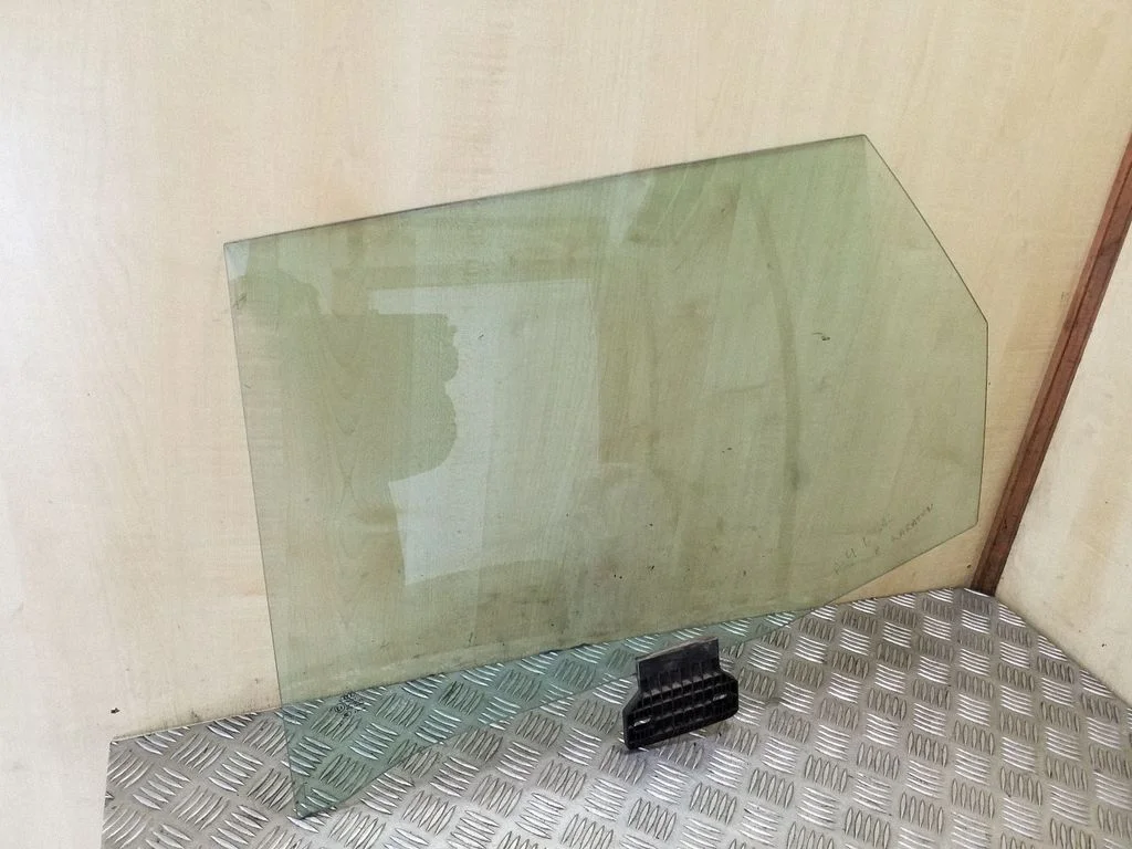 Rear door window glass – left