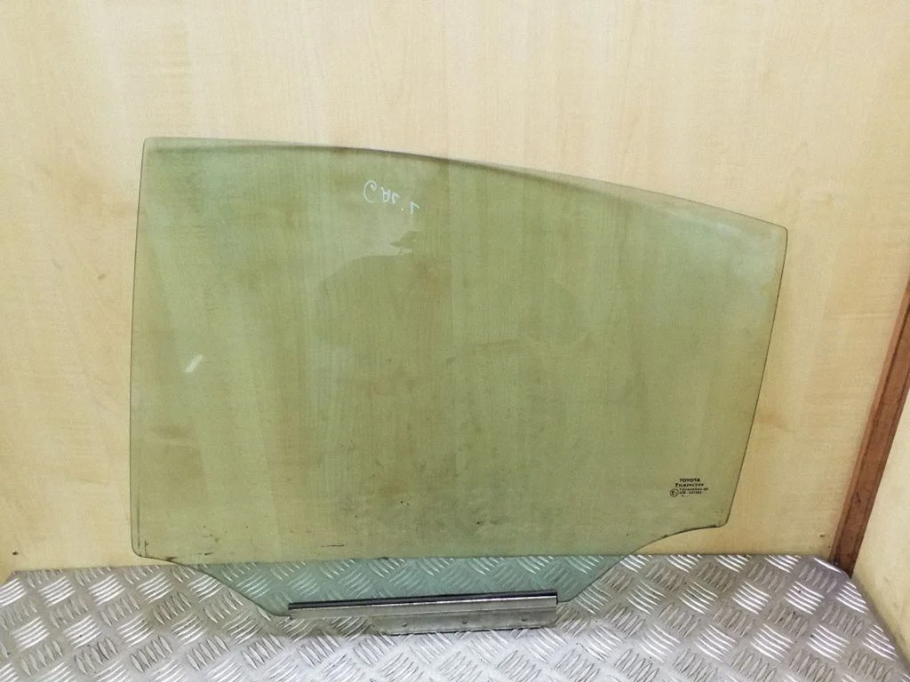Rear door window glass – left
