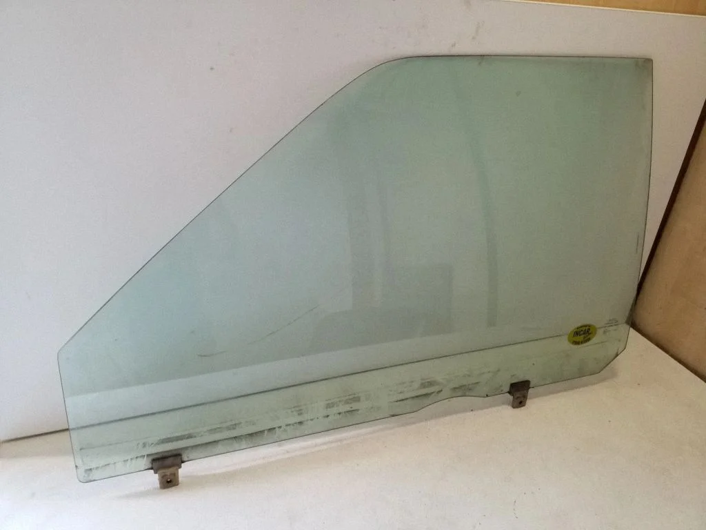 Front door window glass four-door – left