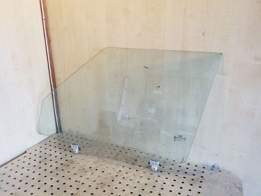 Front door window glass four-door – left