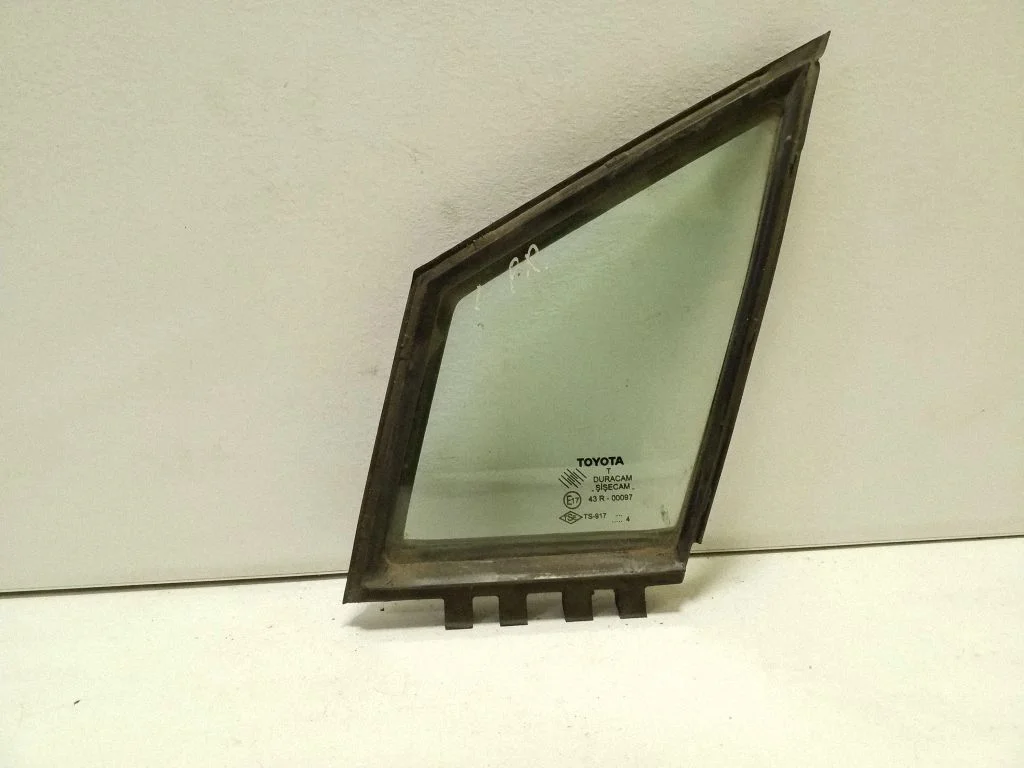 Front door vent window glass four-door – left