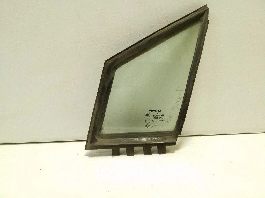 Front door vent window glass four-door – left