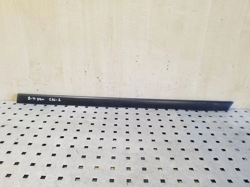 Rear door trim (molding) – left