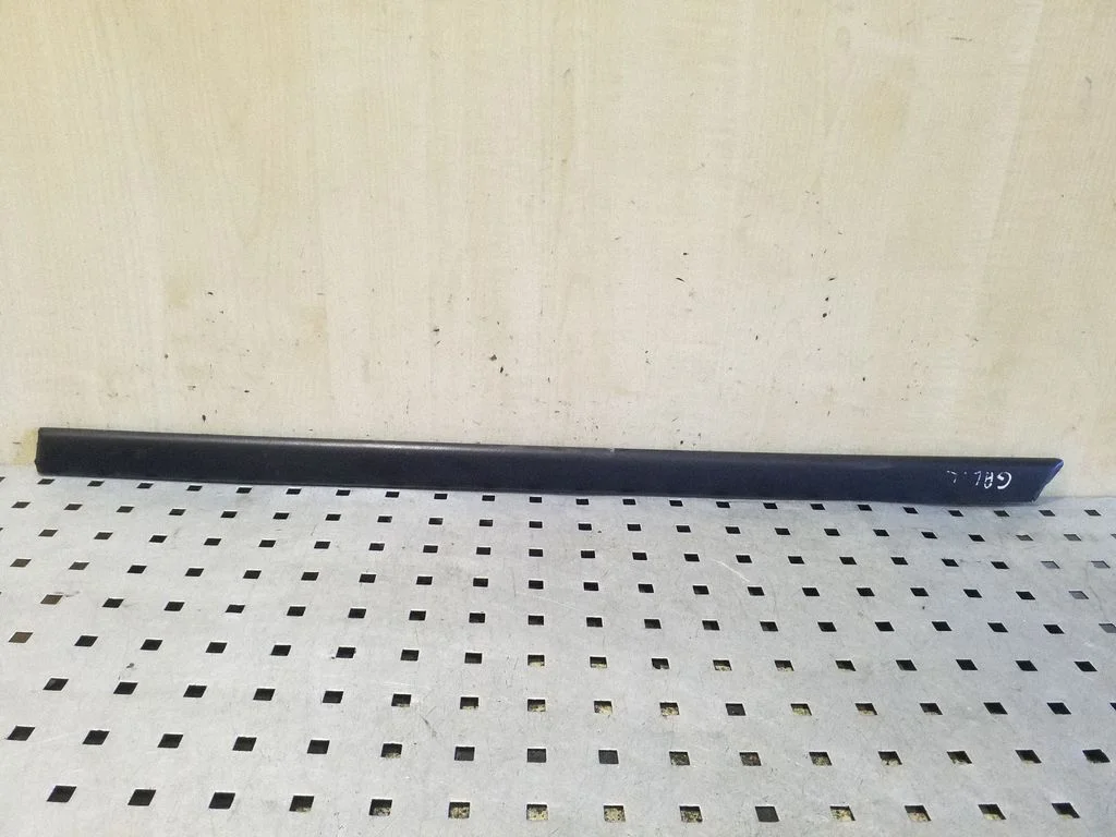 Rear door trim (molding) – left