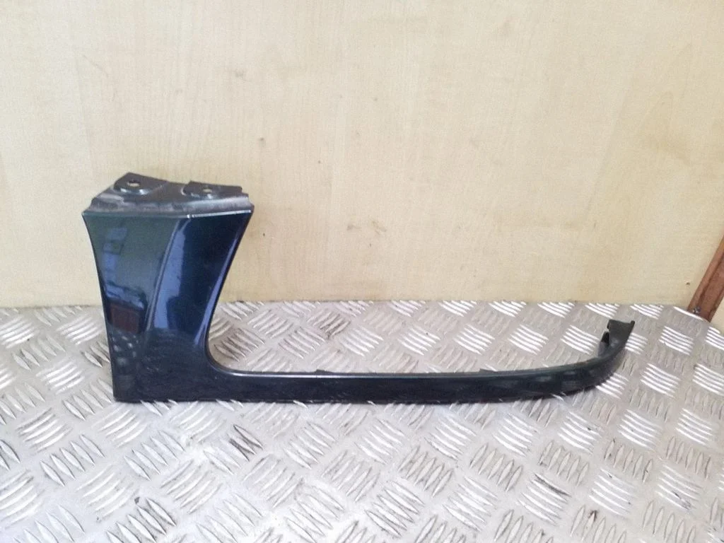 Under headlight/headlamp trim – left