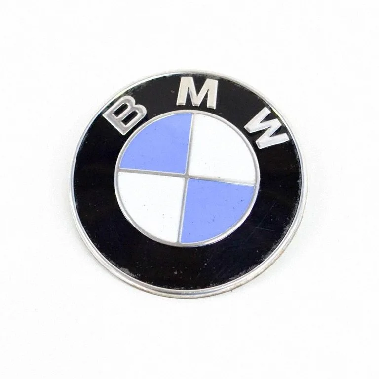 Ražotāja emblēma/modeļa burti 7463715