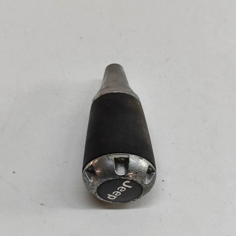 Pārnesumu pārslēga sviras apdare (āda, poga) 52090499AC