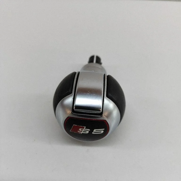 Pārnesumu pārslēga sviras apdare (āda, poga) 8K1713139K