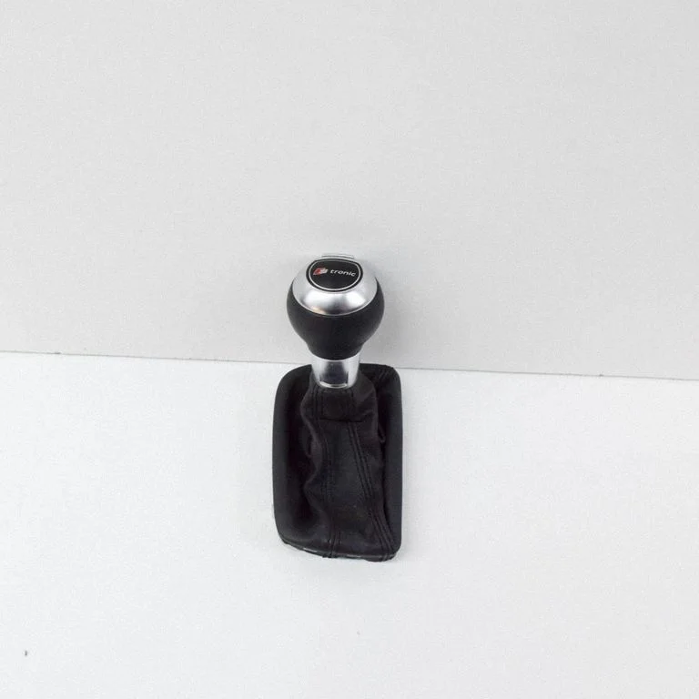 Pārnesumu pārslēga sviras apdare (āda, poga) 8U2713139F