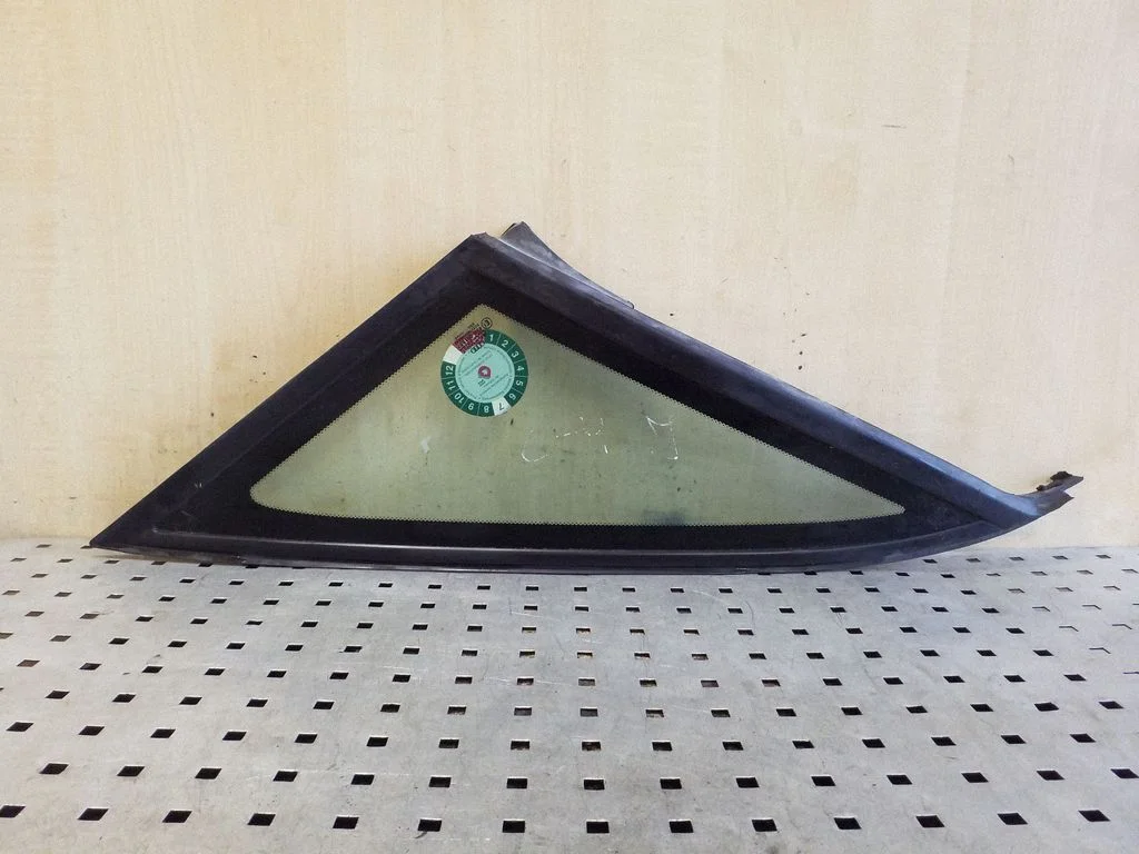 Rear side window – left