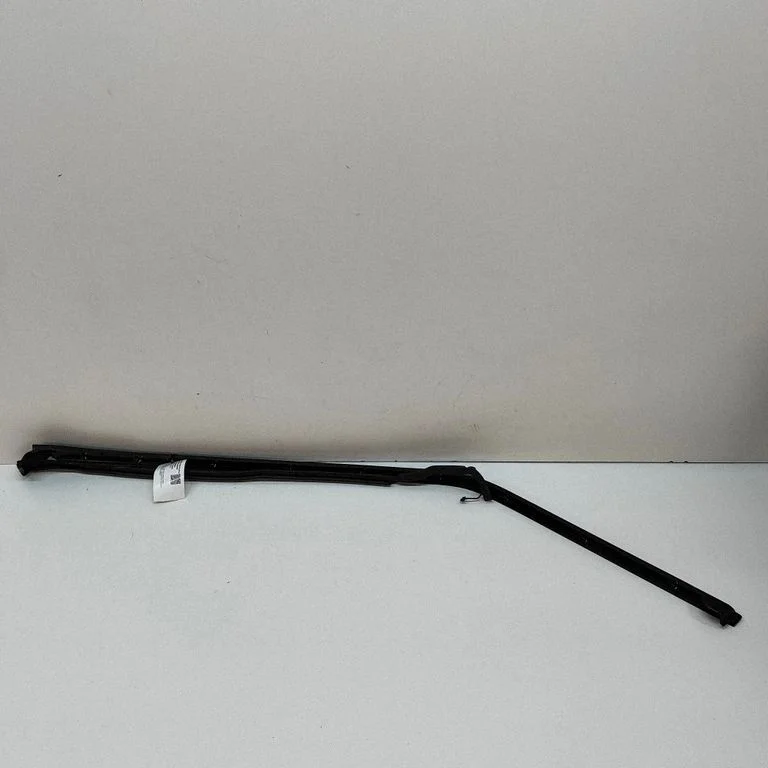 Front door glass trim molding FK6M20518AA