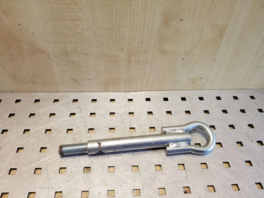 Towing hook eye
